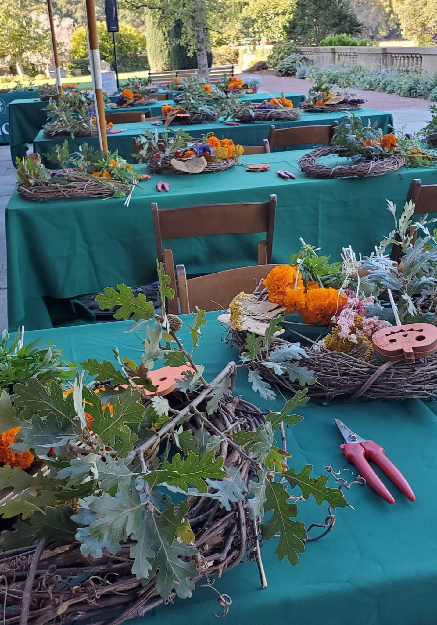 The tables are set on the Ballroom Terrace for 2023's Fall Wreath Party.