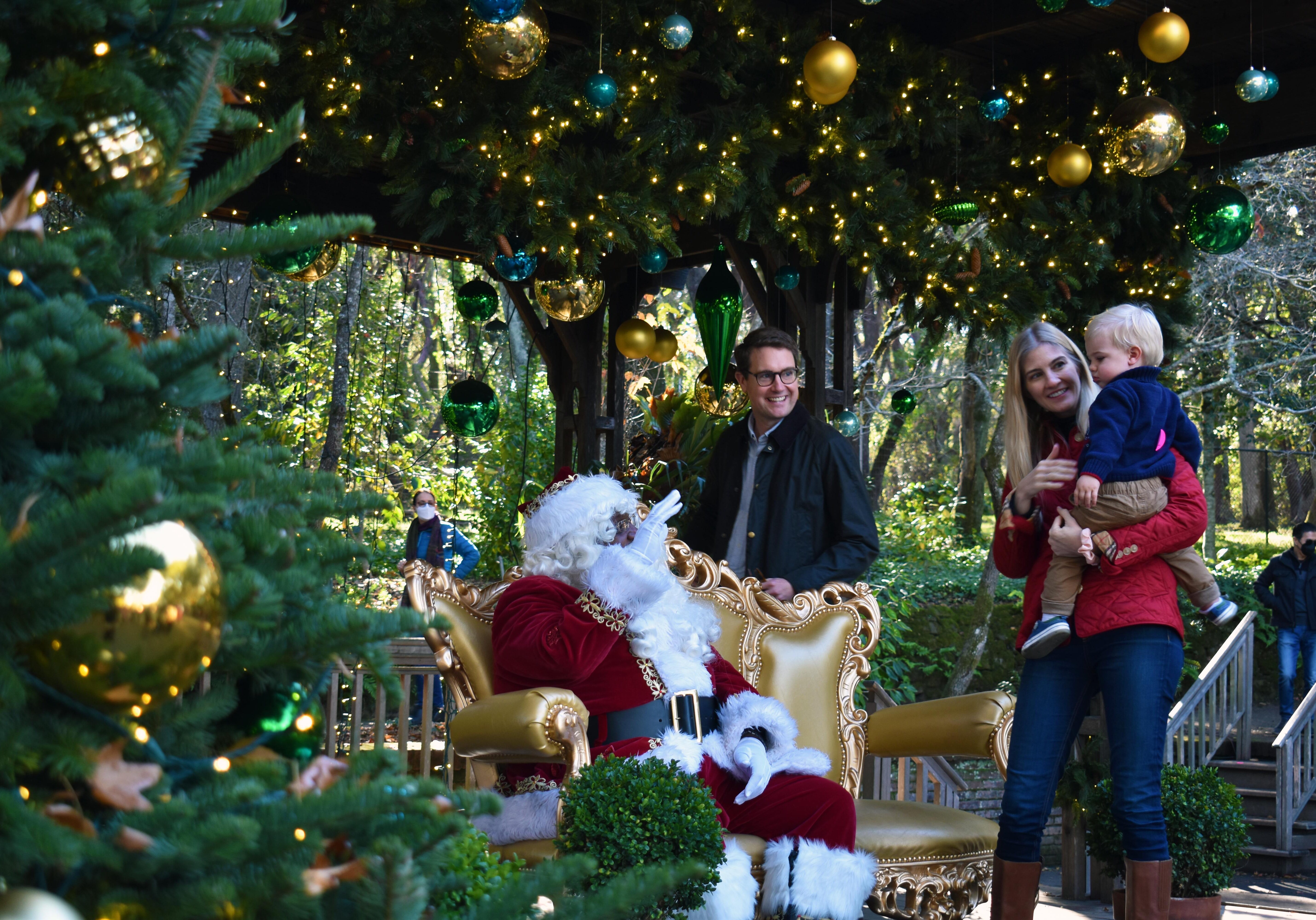 Family Introducing Little One To Santa