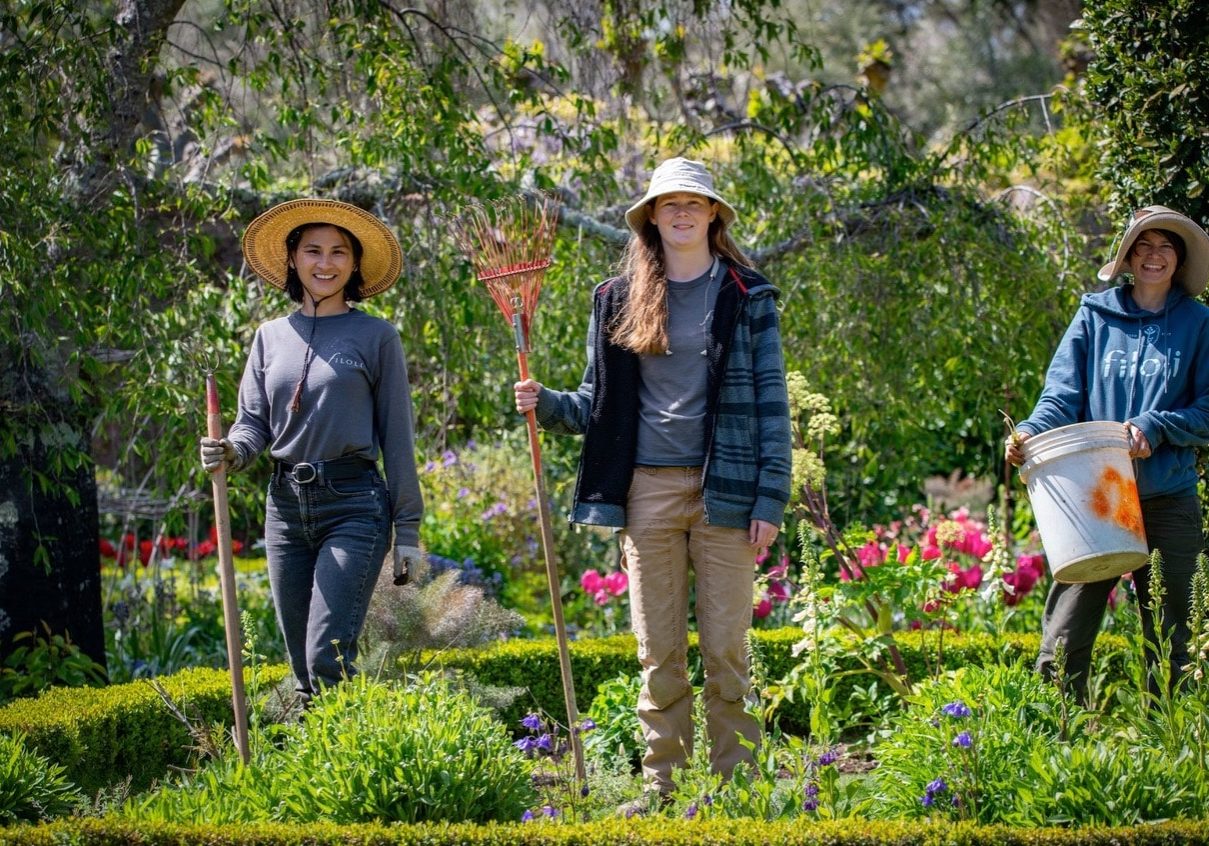 Filoli horticulturists Jia Nocon, Gillian Johnson, and Leslie Freitas working in the Walled Garden.